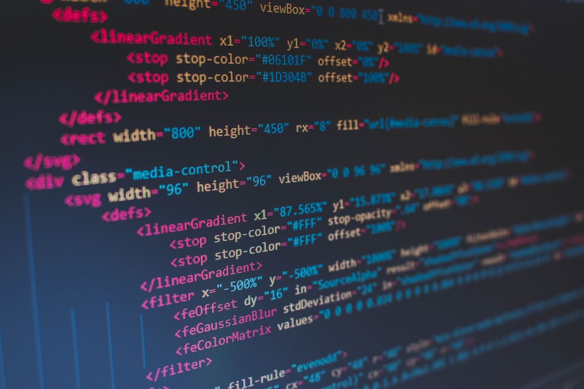 Code on a screen with a dark theme